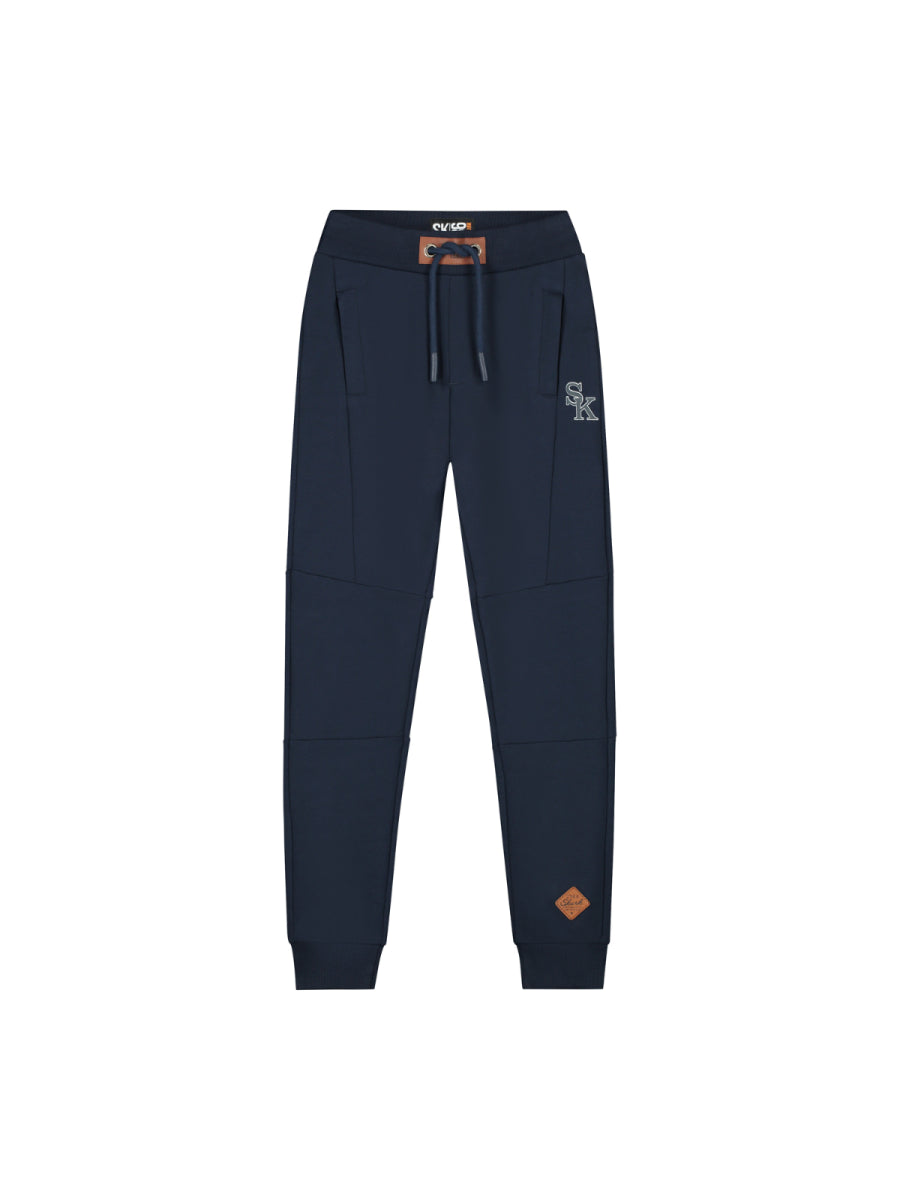 Joggingbroek in zwart voor jongens van het merk SKURK. Zomercollectie 2025
