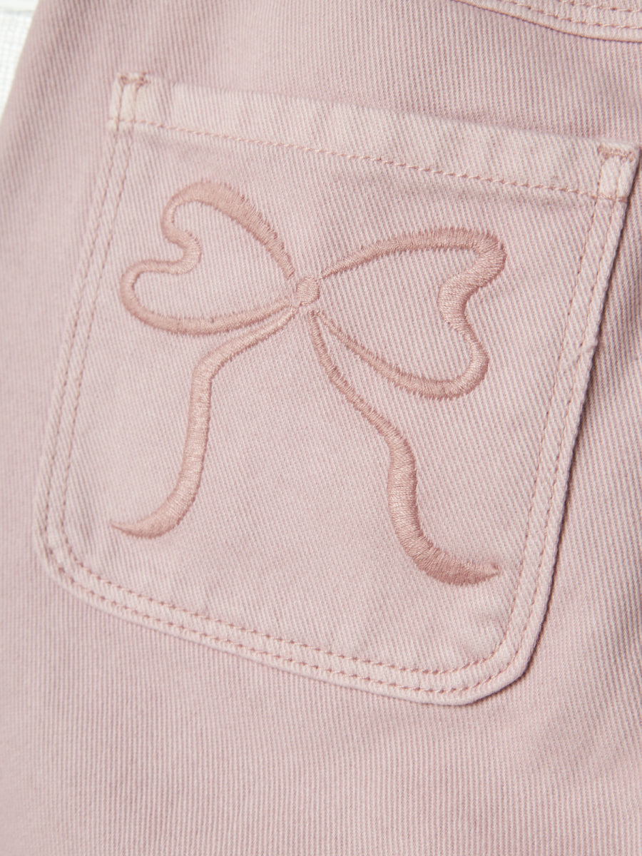 Roze broek voor meisjes in wide fit van name it met print van strik