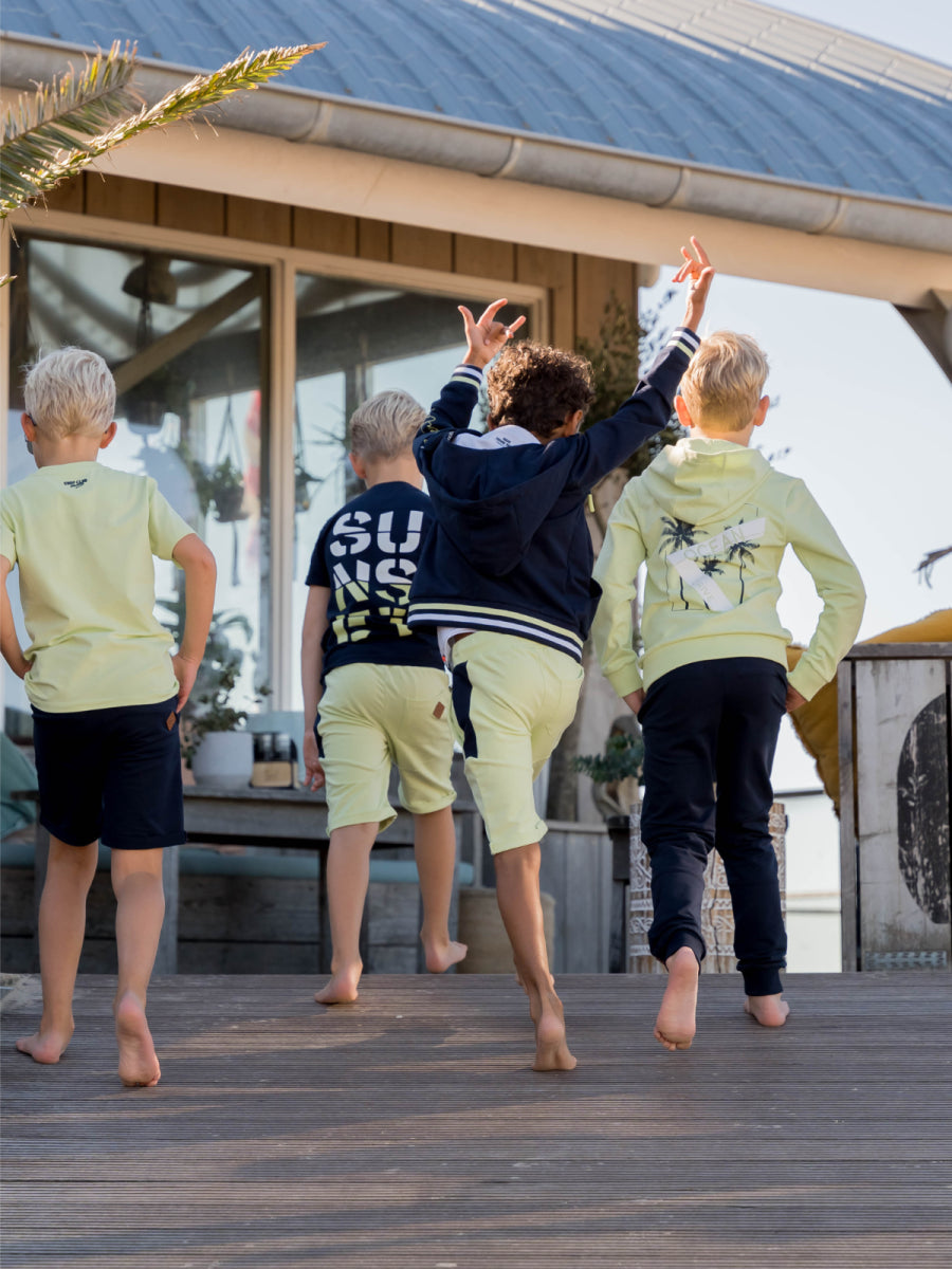Short in lime groen voor jongens van het merk Skurk zomer 2025